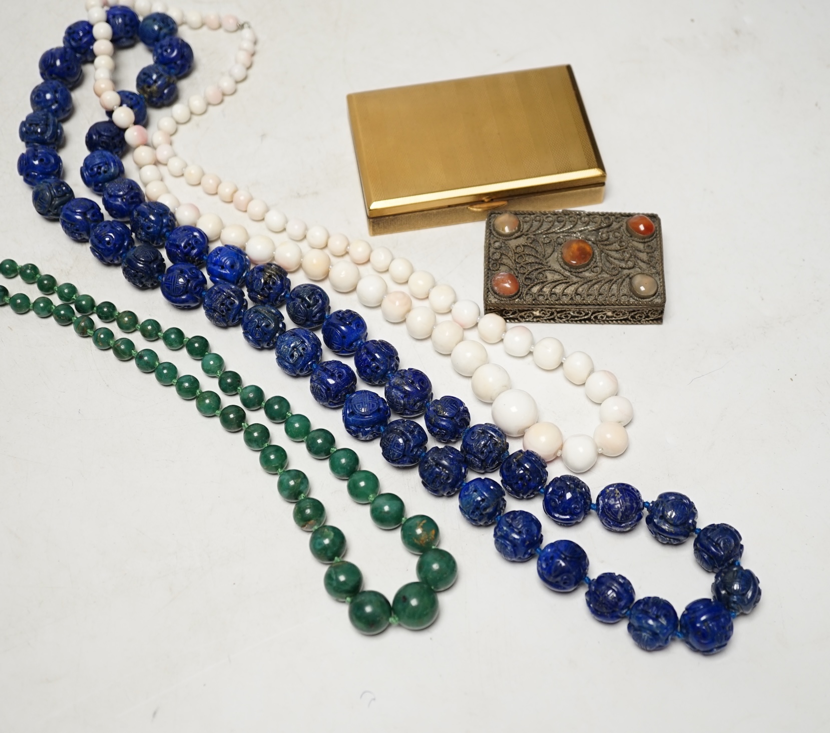 A large quantity of assorted jewellery and other collectables, including silver, costume, compacts, necklaces including carved lapis lazuli, lapis lazuli bead and white coral two yellow metal and gem set brooches, etc. C